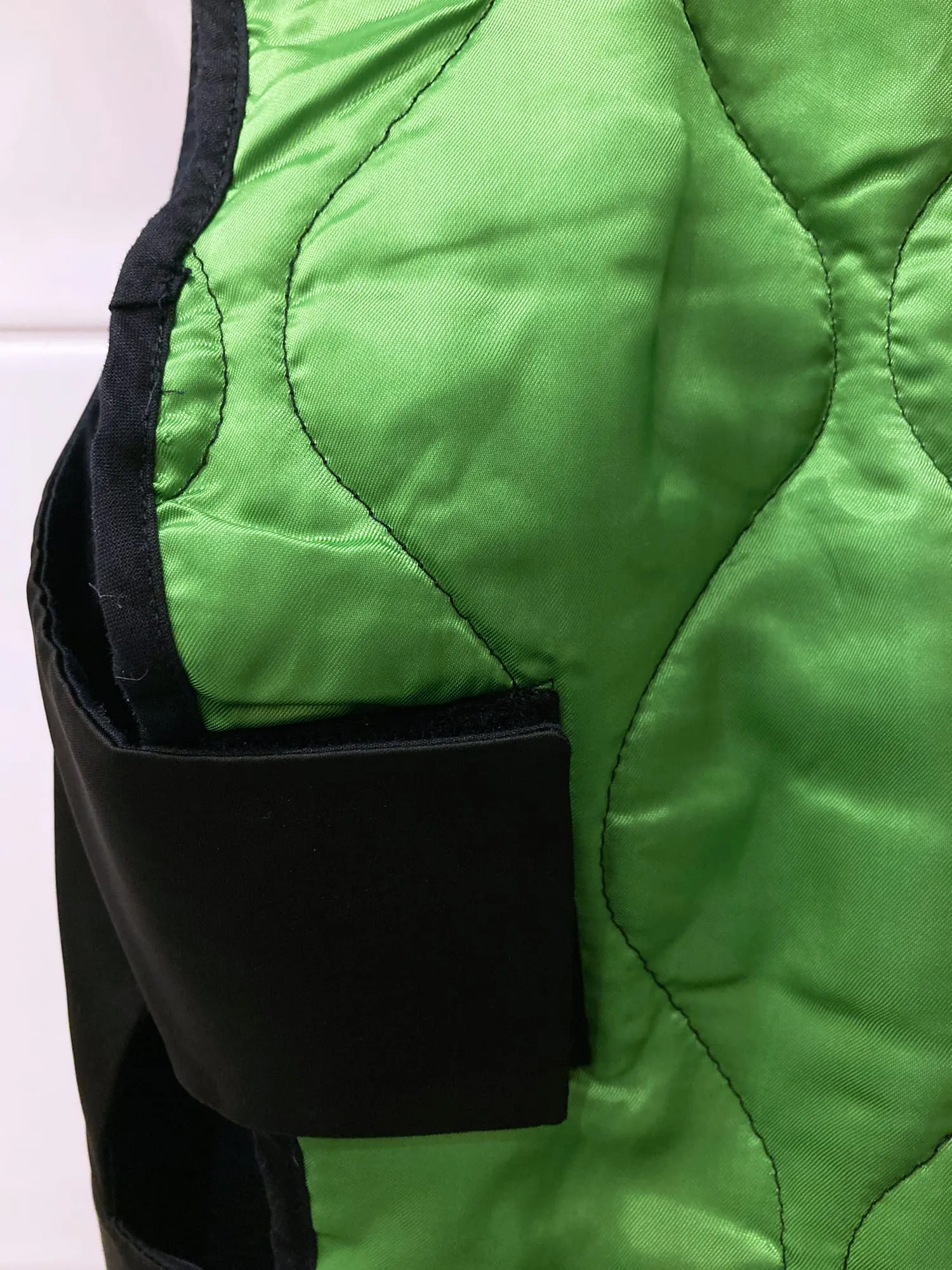 Dirk Bikkembergs 1990s quilted black satin waistcoat with green reversible back
